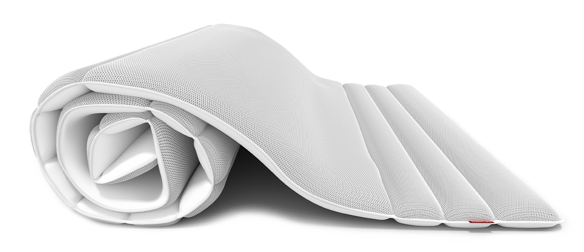 Der BODYGUARD Topper zur Hälfte zusammengerollt