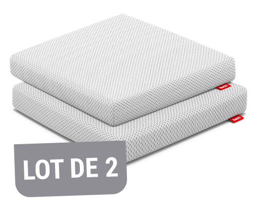 Deux coussins de chaise BODYGUARD® superposés, avec housse blanche texturée. Un encart rouge en haut à droite indique « Lot de 2 ». Les étiquettes rouges bett1 sont visibles.