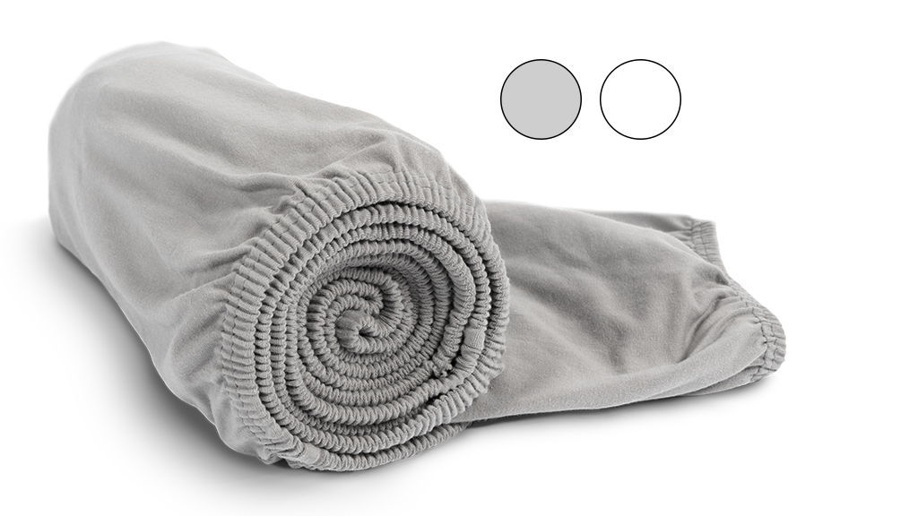 Drap housse roulé gris et un pastille balche et grise en haut à droite.