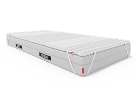 Matelas BODYGUARD® recouvert du surmatelas BODYGUARD®. l'élastique du coin gauche est apparent
