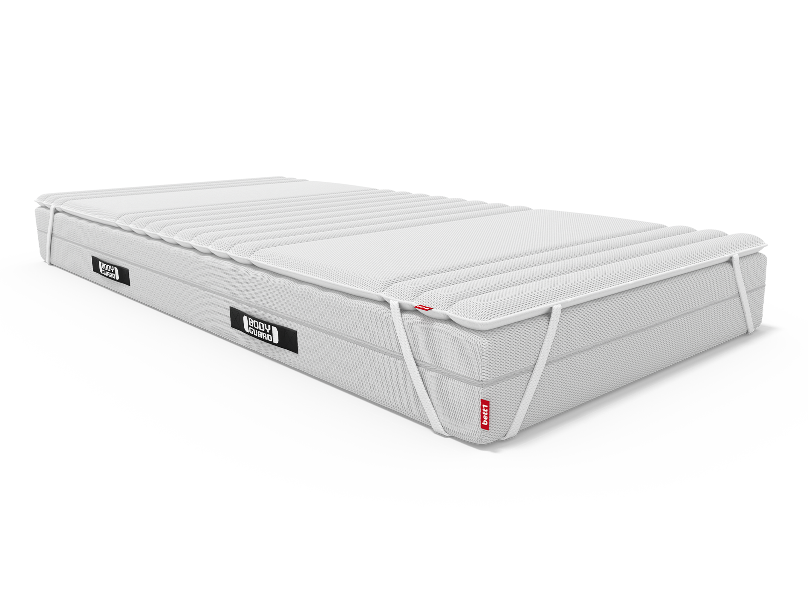 Matelas BODYGUARD® recouvert du surmatelas BODYGUARD®. l'élastique du coin gauche est apparent