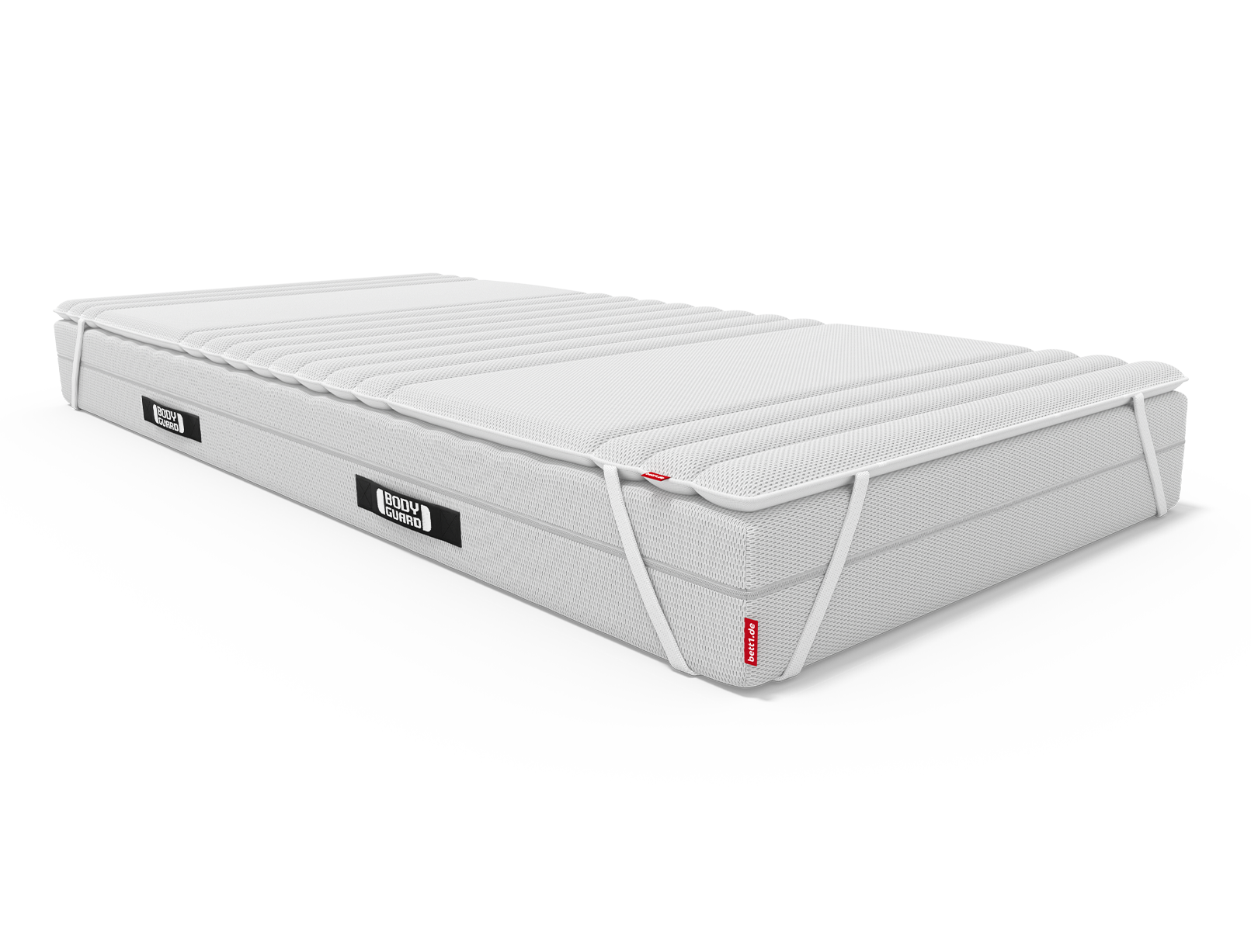 Matelas BODYGUARD® recouvert du surmatelas BODYGUARD®. l'élastique du coin gauche est apparent
