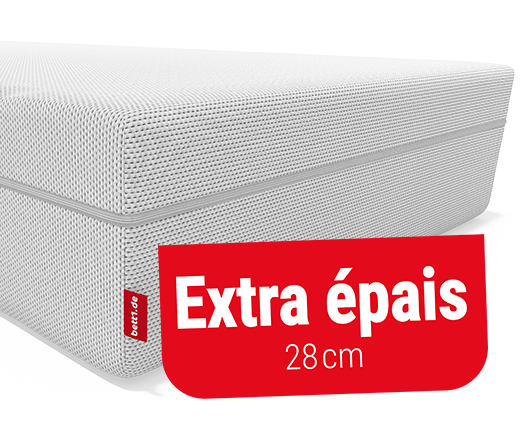 Image d’un Matelas Flip® en coupe, montrant sa structure en mousse sans ressorts, avec un bandeau rouge indiquant « 100 % mousse"