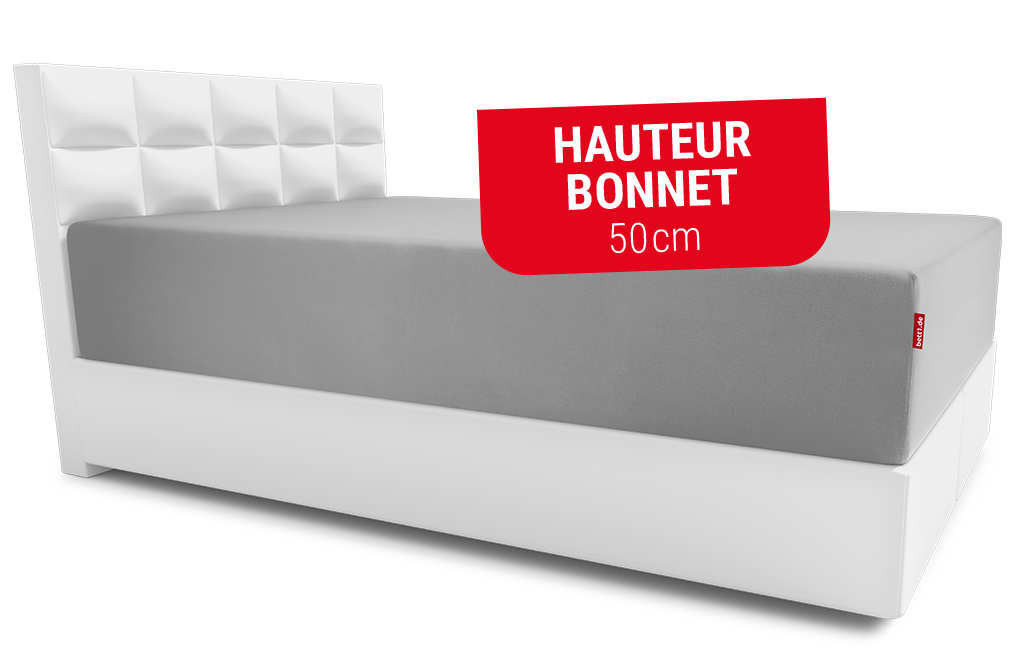 Lit avec un drap-housse BODYGUARD® sur le matelas Boxspring BODYGUARD®. Texte : hauteur bonnet 50cm